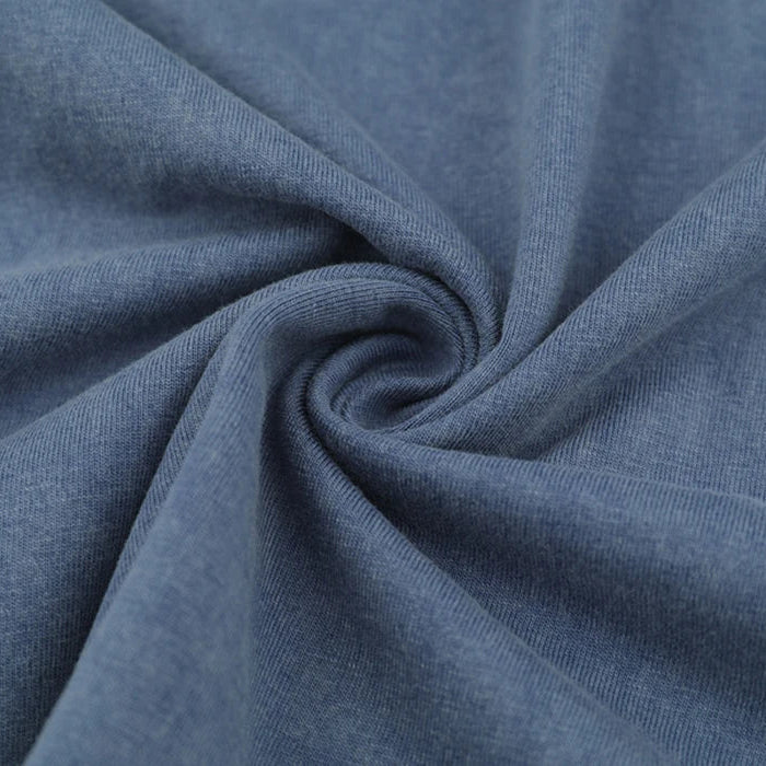 Close-up of blue fabric with a swirl pattern