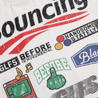 White t-shirt with colorful graphics and text on a white background