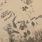 Beige fabric with black botanical illustrations and text
