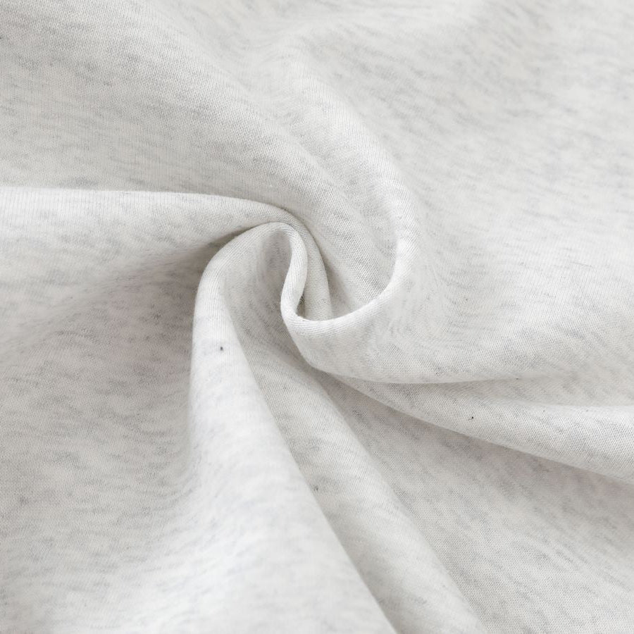Close-up of gray fabric with a subtle pattern