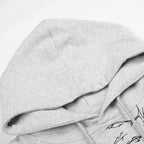 Gray hoodie with a graphic design on a light gray background