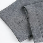 Gray fabric with a subtle pattern on a white background