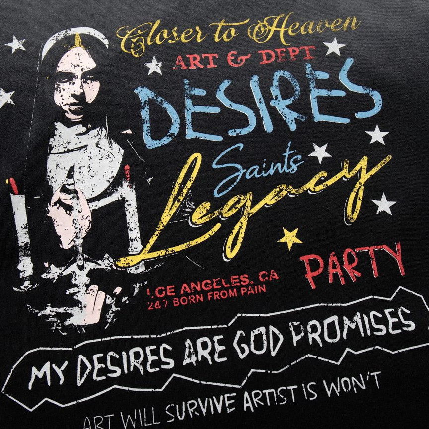 Black t-shirt with artistic design and text on a dark background