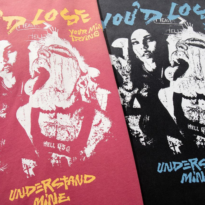 Two t-shirts with graphic designs and text on a plain background