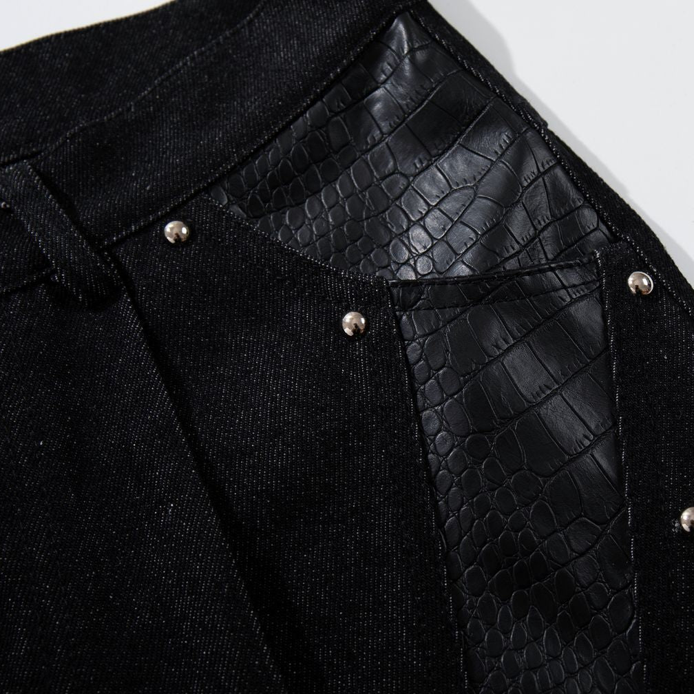 Close-up of a black Venom Stitch Panel Jeans with button details