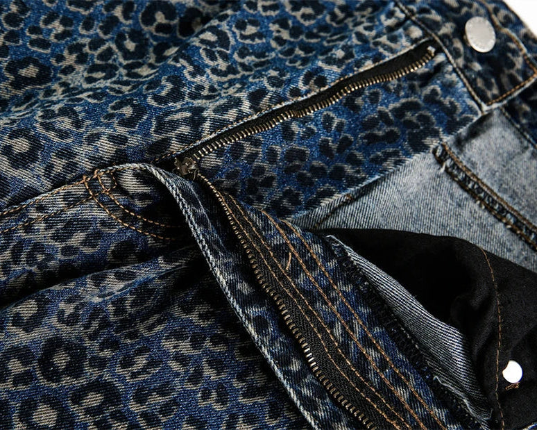 Close-up of blue denim jacket with leopard print pattern
