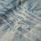 Close-up of textured blue denim fabric