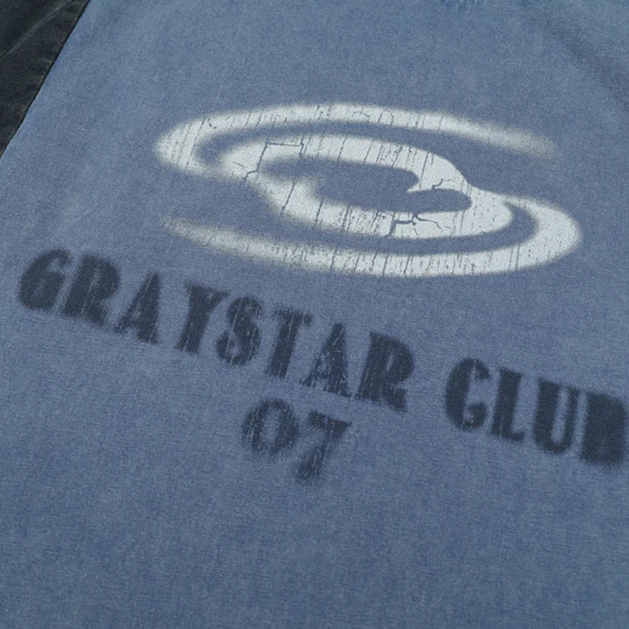 Gray t-shirt with 'GRAYSTAR CLUB 07' text and logo on a dark surface