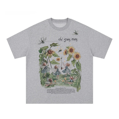 Gray t-shirt with fairy and floral design on a white background
