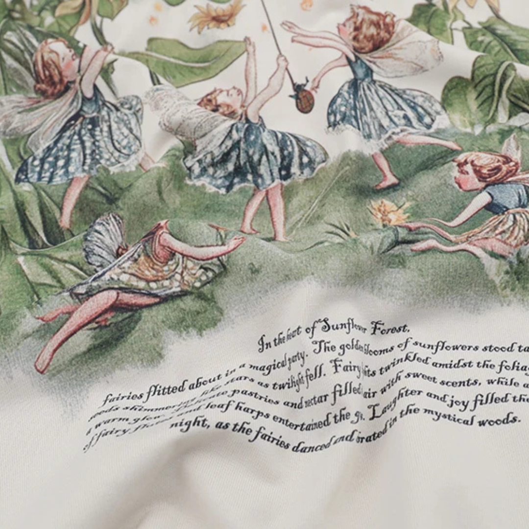 tshirt Illustration of fairies in a forest with text describing a magical night. 