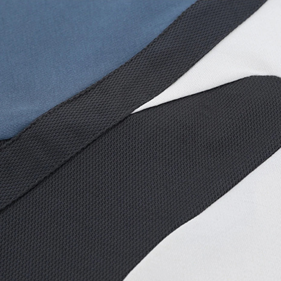 Close-up of fabric with blue, black, and white sections