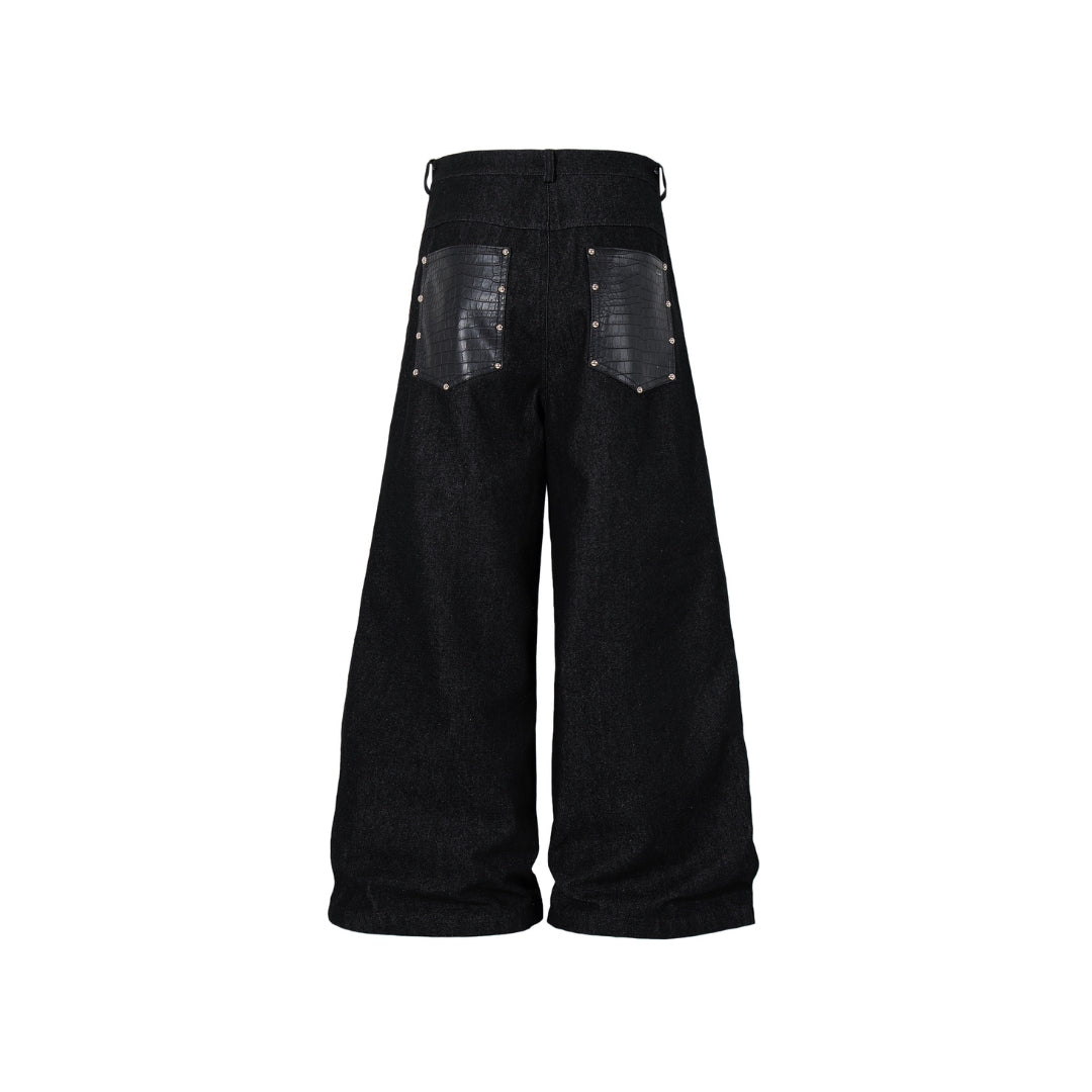 Black wide-leg Venom Stitch Panel Jeans pants with sheer panels on a white background