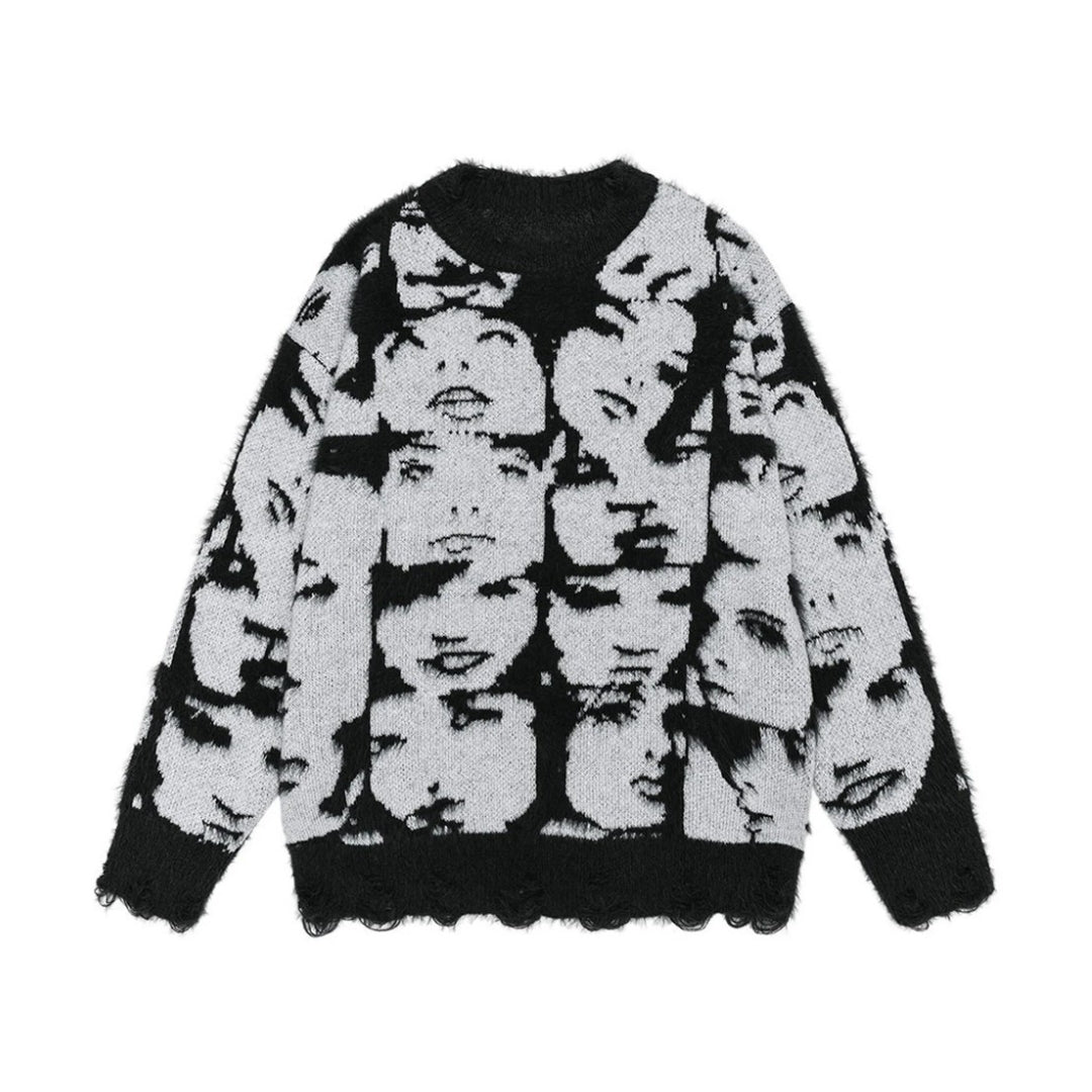 Sweater with black and white face pattern on a white background